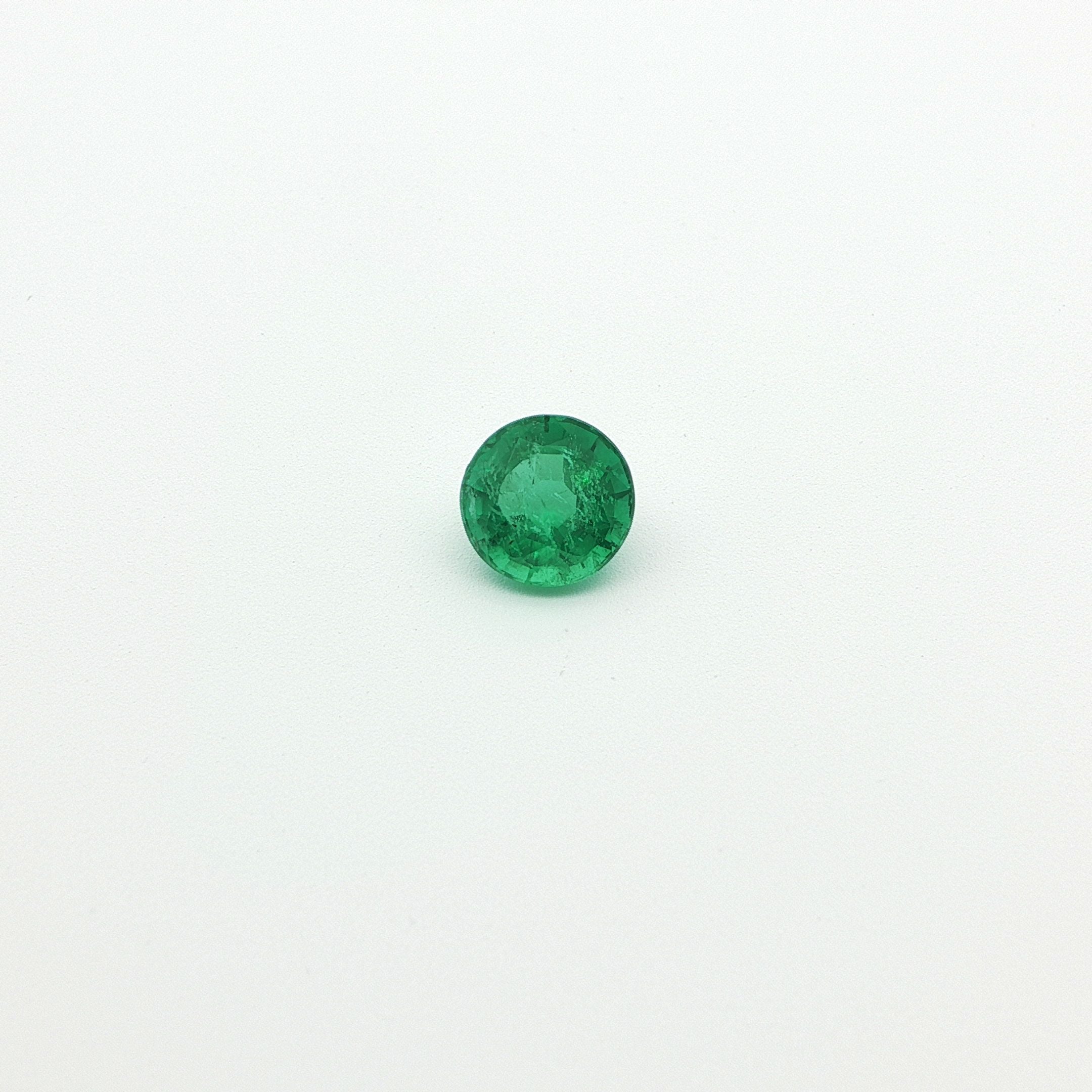 1.01ct Round Natural Emerald (Colour Green, Clarity Slightly Included, Cut Faceted)
