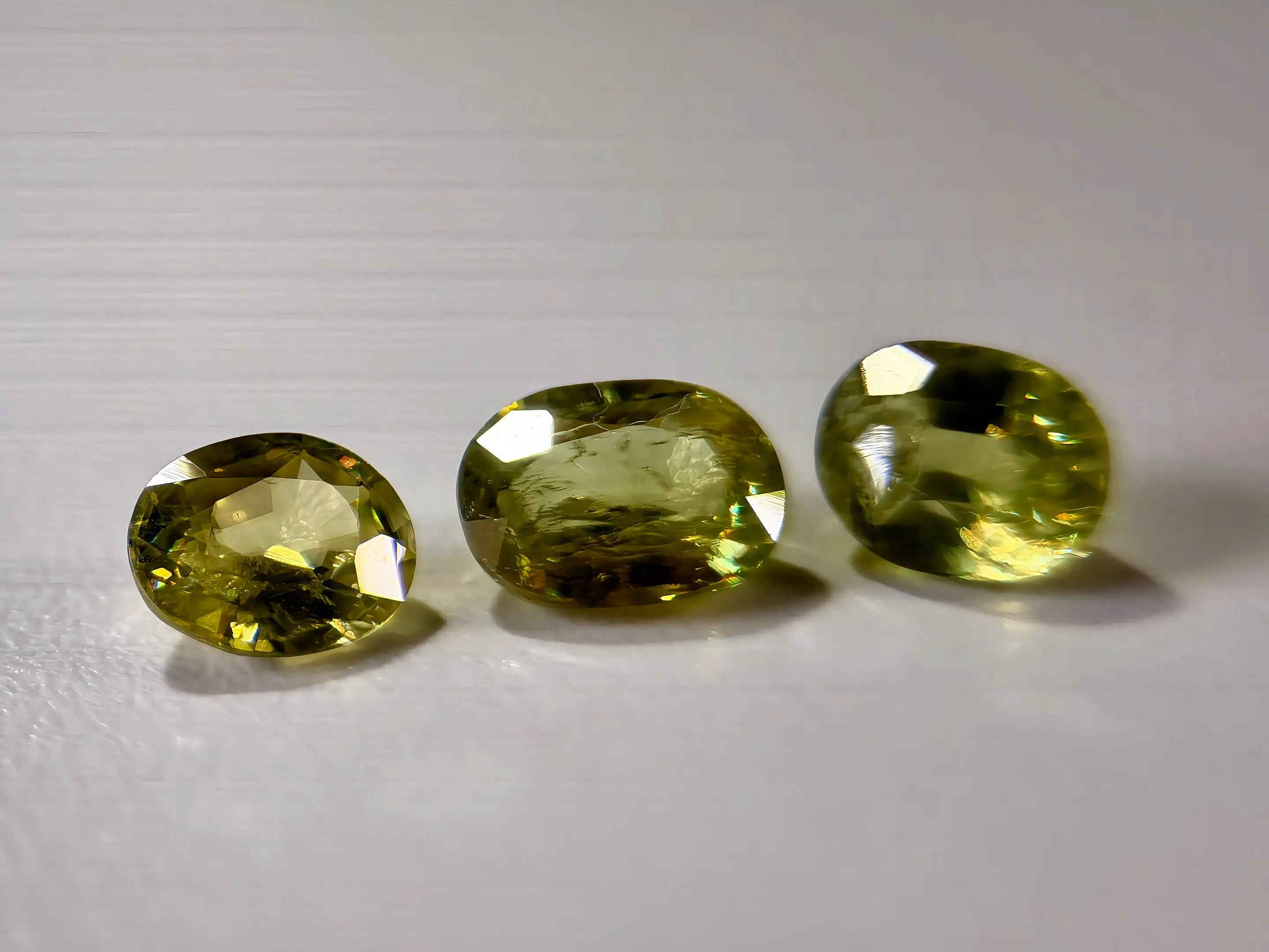 3-Piece Natural Sphene Suite - Matching Pair & Darker Statement Center - 2.44ct Total  (WAV49)