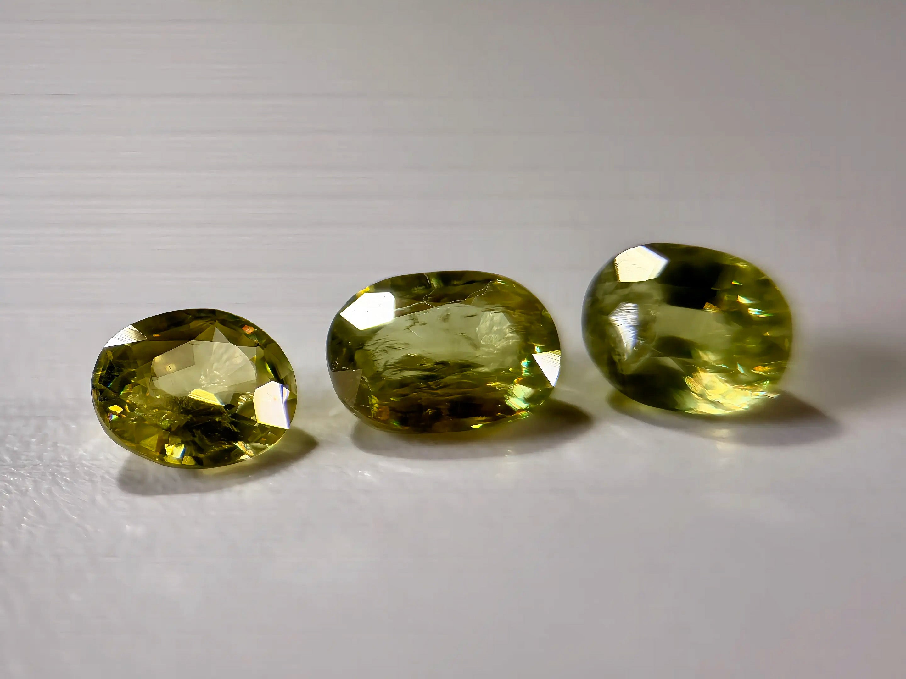 3-Piece Natural Sphene Suite - Matching Pair & Darker Statement Center - 2.44ct Total  (WAV49)