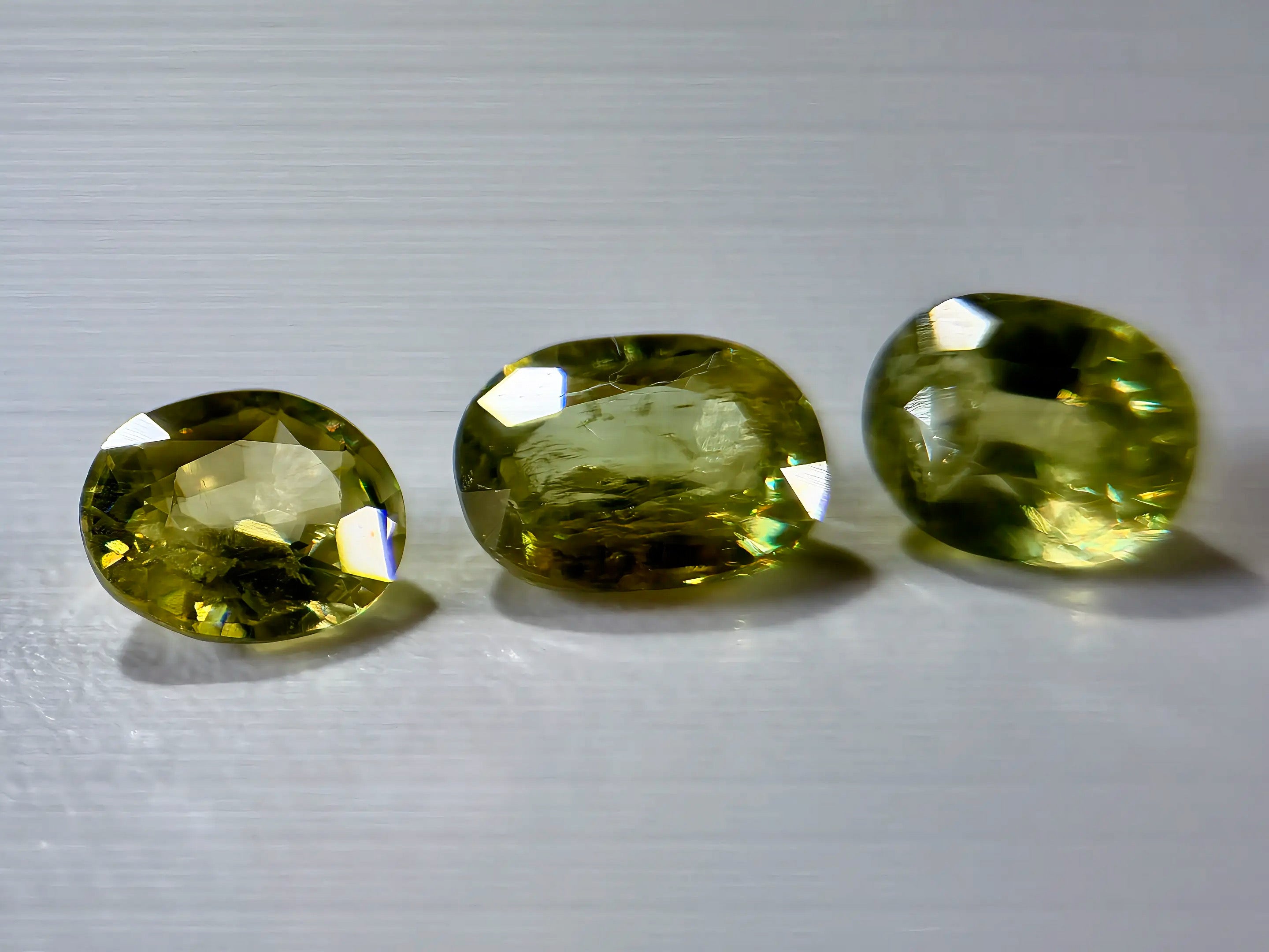 3-Piece Natural Sphene Suite - Matching Pair & Darker Statement Center - 2.44ct Total  (WAV49)