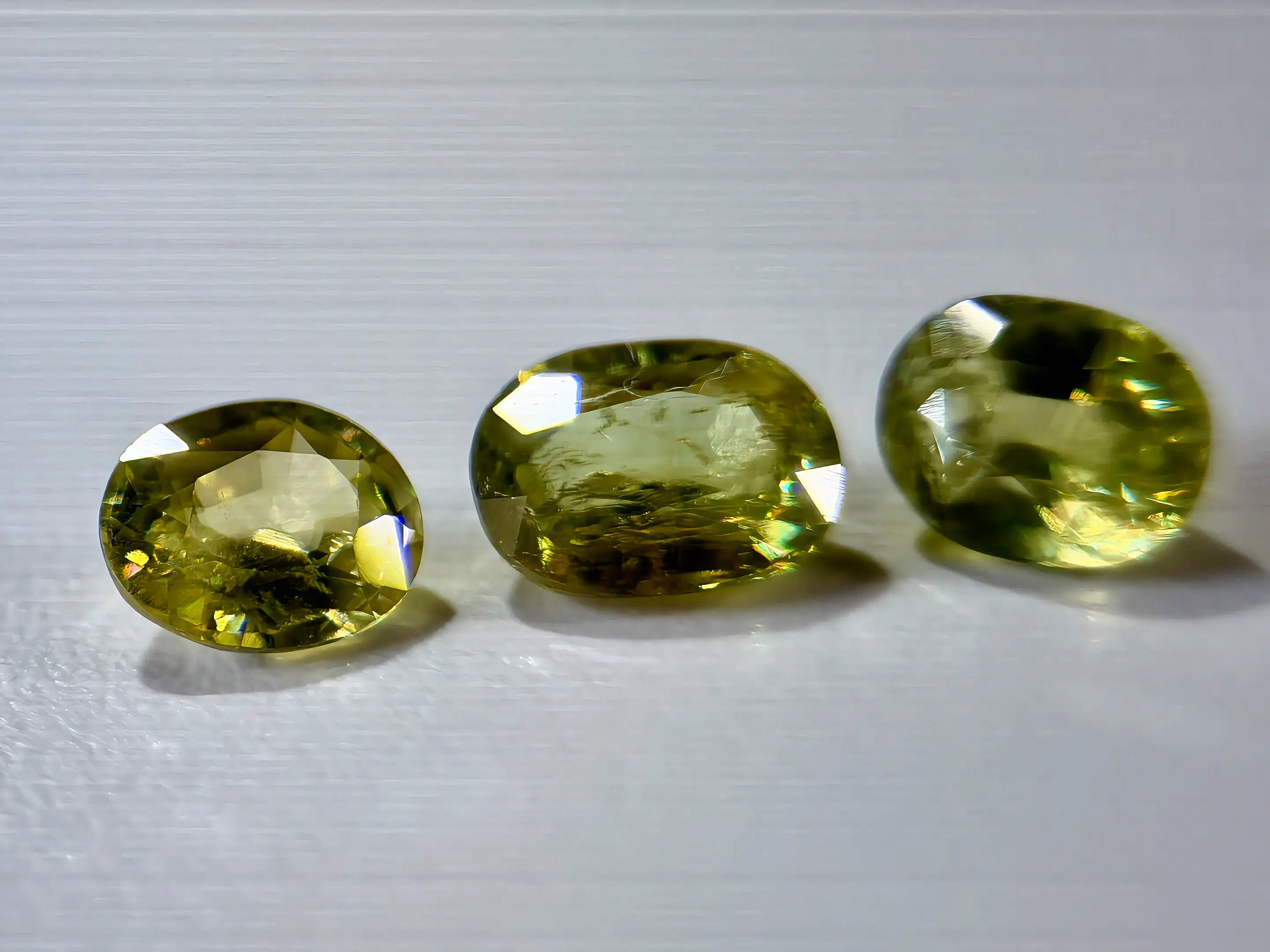 3-Piece Natural Sphene Suite - Matching Pair & Darker Statement Center - 2.44ct Total  (WAV49)