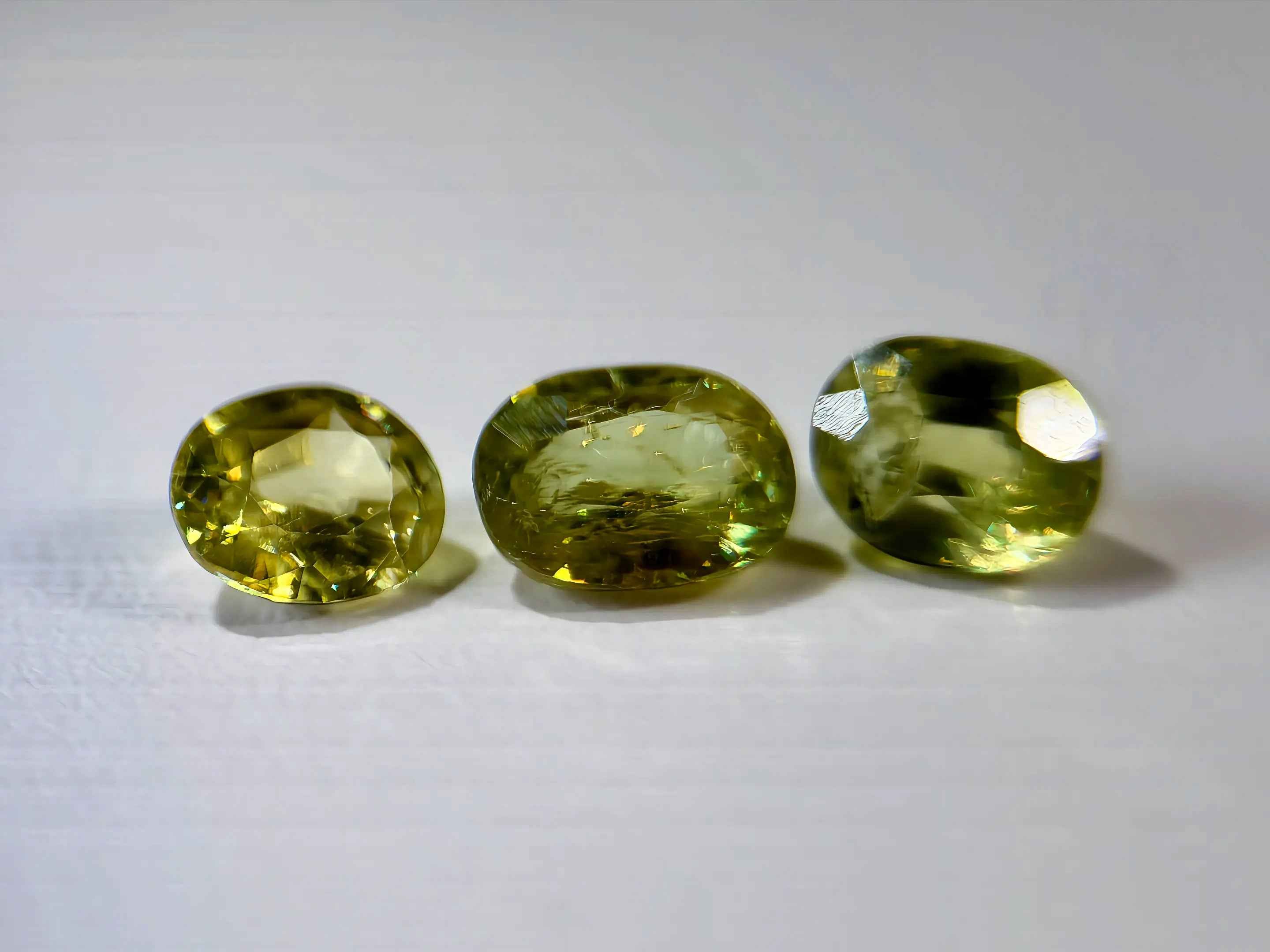 3-Piece Natural Sphene Suite - Matching Pair & Darker Statement Center - 2.44ct Total  (WAV49)
