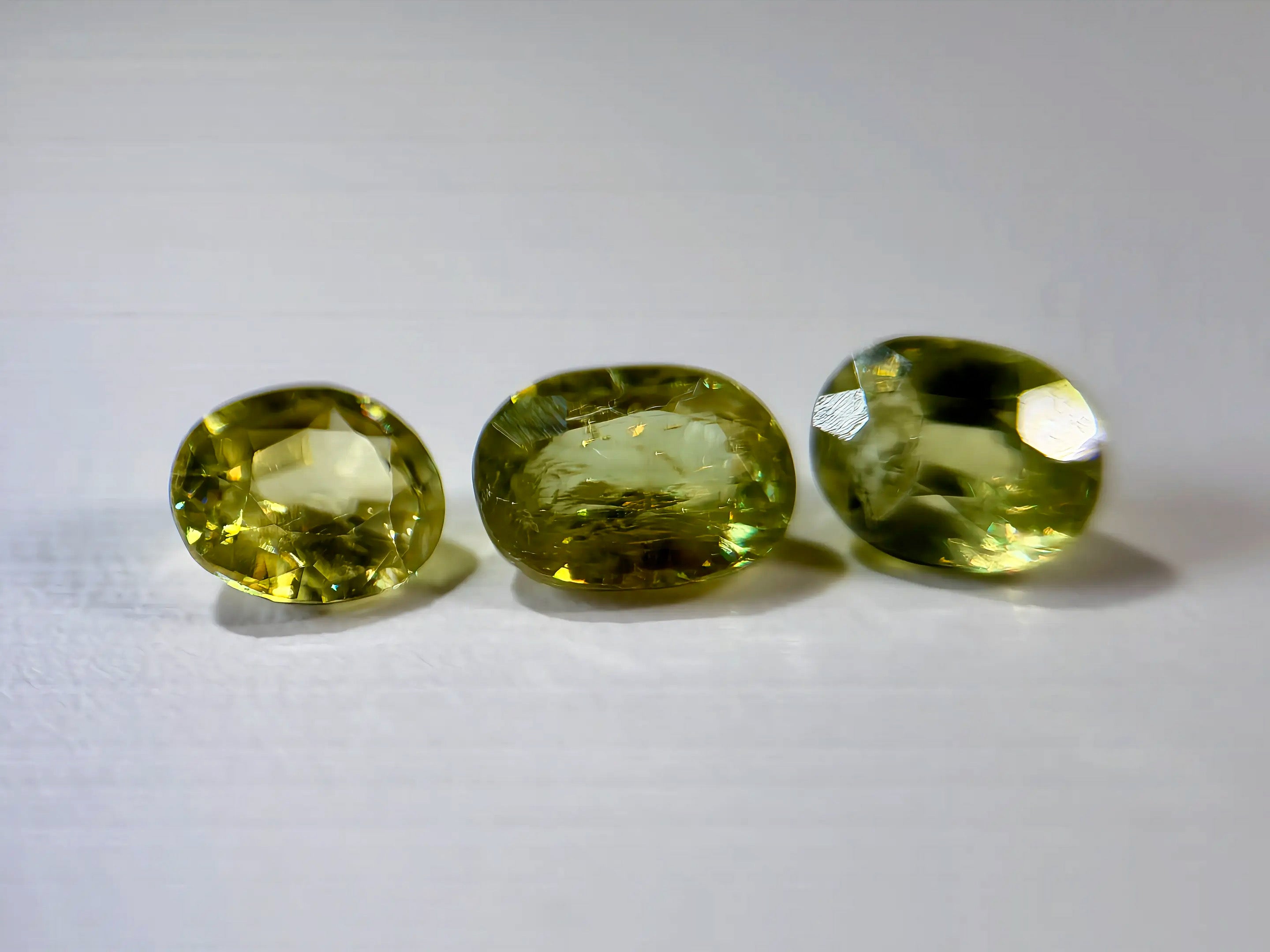 3-Piece Natural Sphene Suite - Matching Pair & Darker Statement Center - 2.44ct Total  (WAV49)
