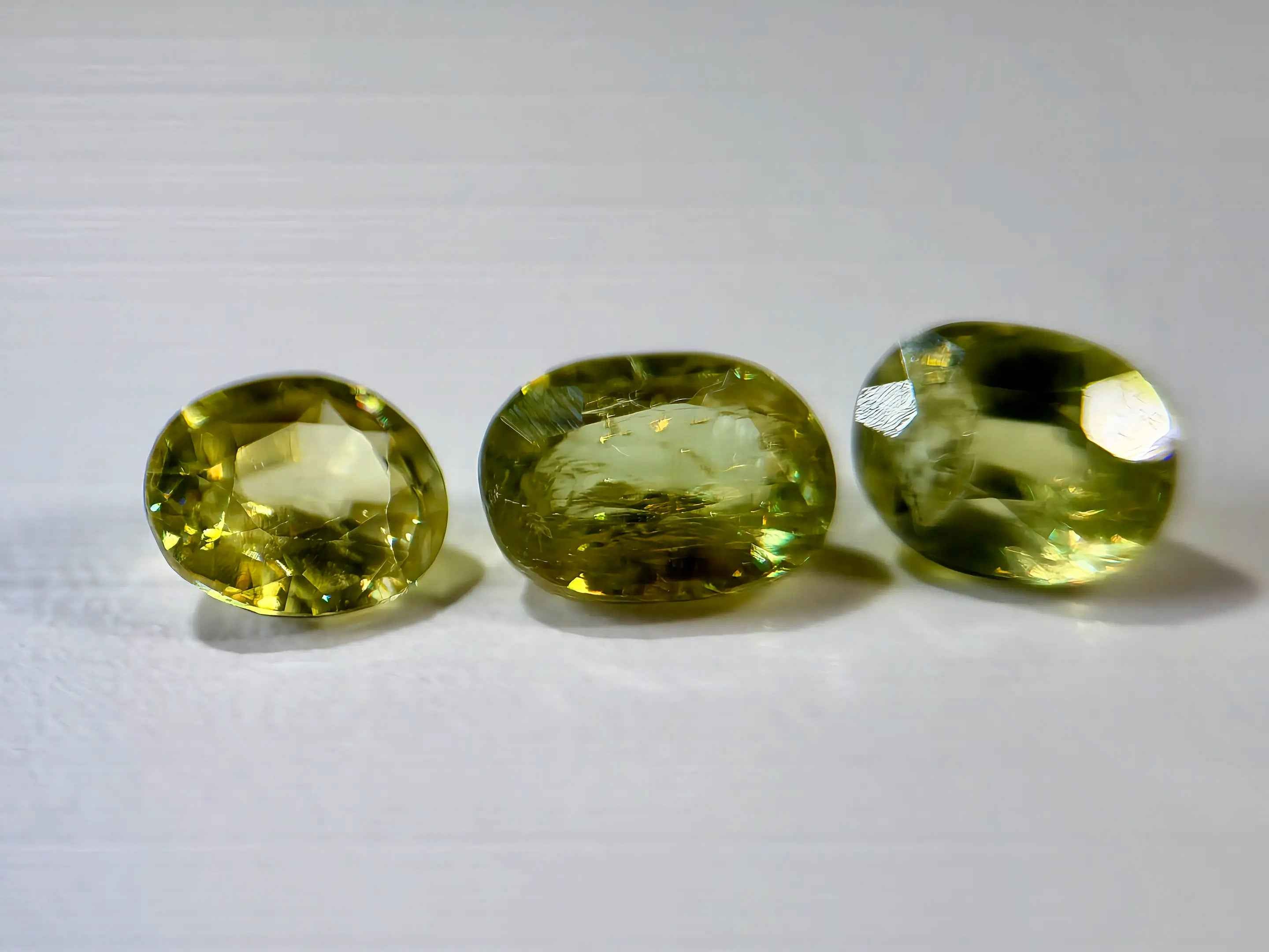 3-Piece Natural Sphene Suite - Matching Pair & Darker Statement Center - 2.44ct Total  (WAV49)