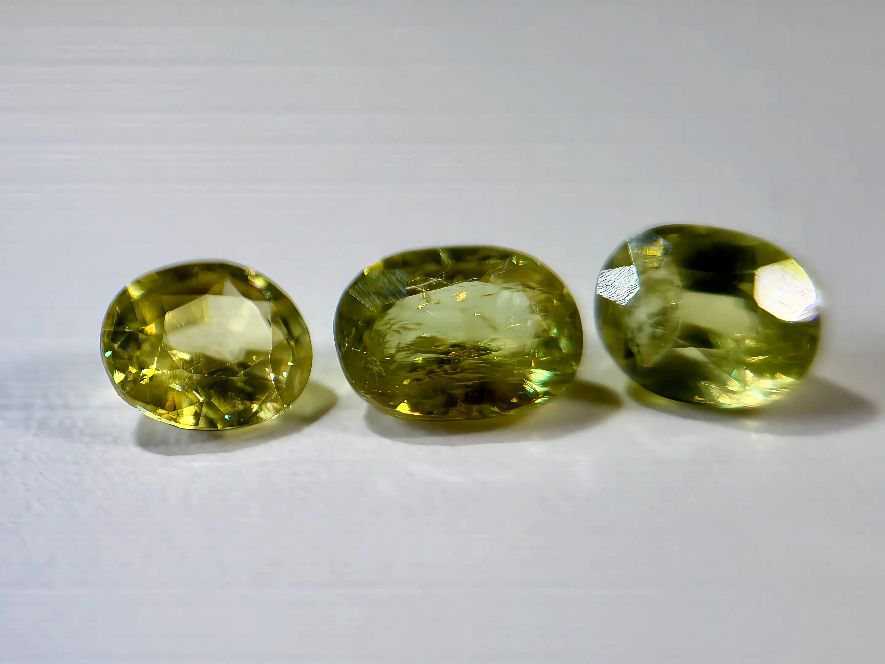3-Piece Natural Sphene Suite - Matching Pair & Darker Statement Center - 2.44ct Total  (WAV49)